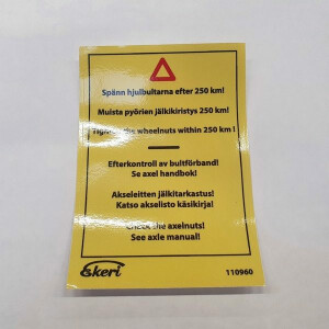 Varoitus tarra pyöräpulttien jälkikiristys kuva
